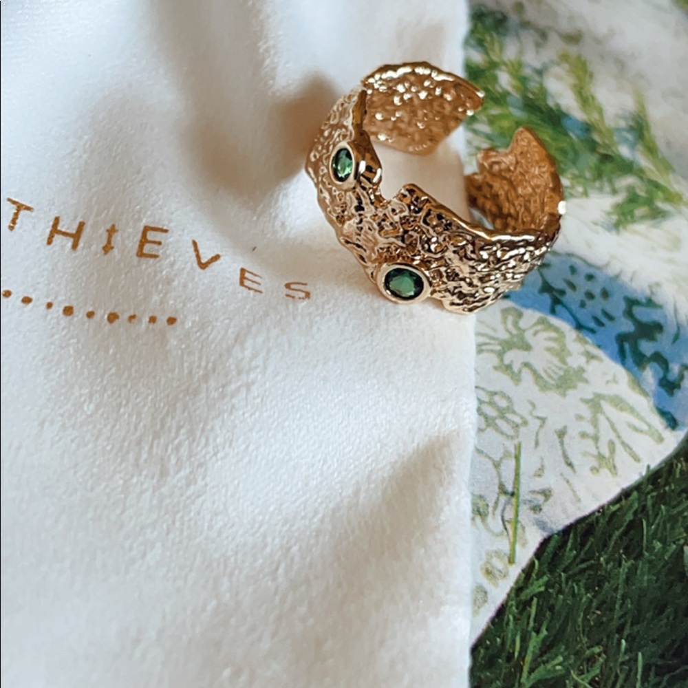 Elegant Gold Textured Ring with Green Accents
